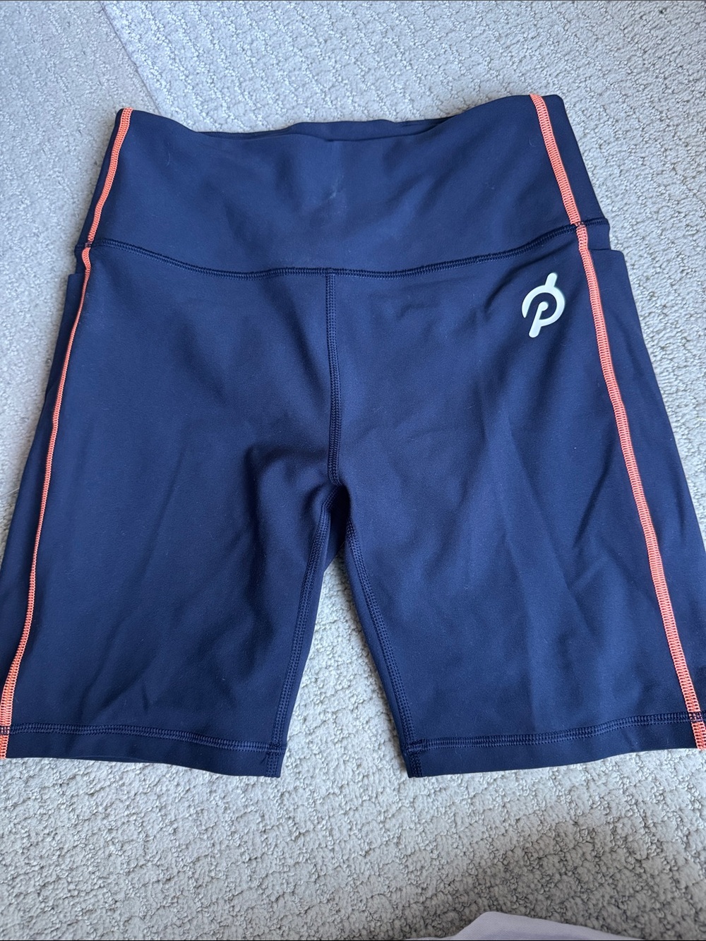 Peloton Navy Bike Shorts with Coral Side Piping